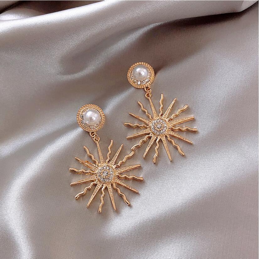 Sun Gods Pearl Earrings: Divine Elegance Meets Modern Glamour