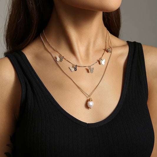 Pearl & Butterfly Layered Necklace: Timeless Elegance Meets Whimsical Charm